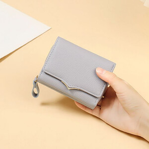 کیفیت کیف پول زنانه تاشو تائومیک‌میک