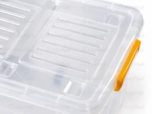 نمای نزدیک درپوش و دستگیره نارنجی صندوق چرخدار شفاف بزرگ صنعت