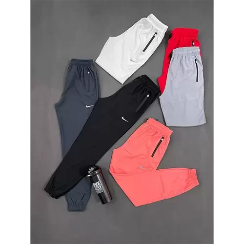 شلوار زنانه ورزشی زیپ دار طرح نایک کد 7129048