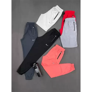 شلوار زنانه ورزشی زیپ دار طرح نایک کد 7129048