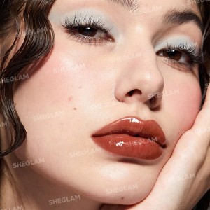 حجم دهنده لب  POUT-PERFECT SHINE LIP PLUMPER-PEACHY KEEN شیگلم SHEGLAM