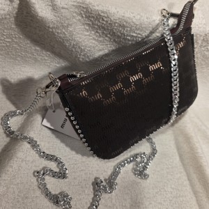 کیف تیله ای میو میو 1313