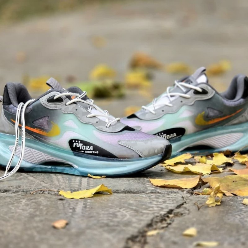 حراج ویژه  کفش اسپرت  مردانه پسرانه مدل  نایک زیره کپسولی رنگ  طوسی آبی زیره پیو یه کار  جدید و شیک  با ارسال رایگان