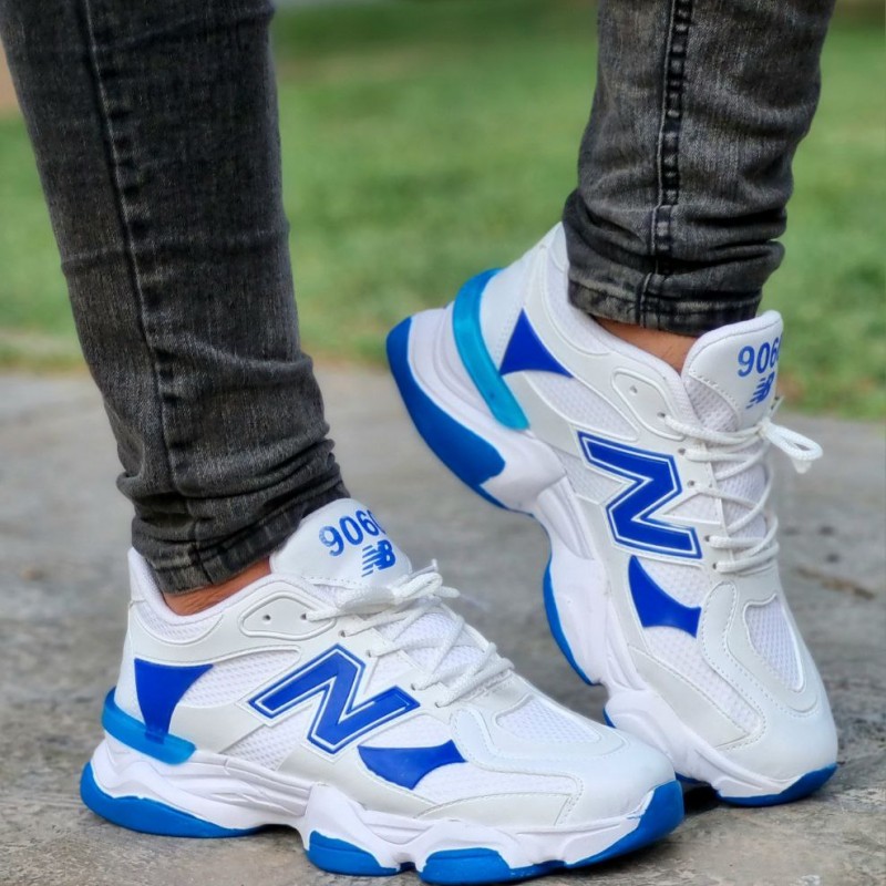 حراج فوق العاده این هفته کفش کتونی اسپرت مردلنه و پسرانه مدل نیوبالانس رنگ سفید آبی یه کار خاص و مناسب برای افراد شیک پوش  با ارسال رایگان