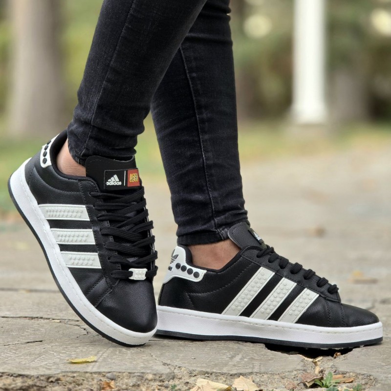 حراج واقعی کفش کتونی اسپرت مردانه و پسرانه مدل لگو رنگ مشکی سفید یهه کار جدید و بی نظیرر با ارسال رایگان