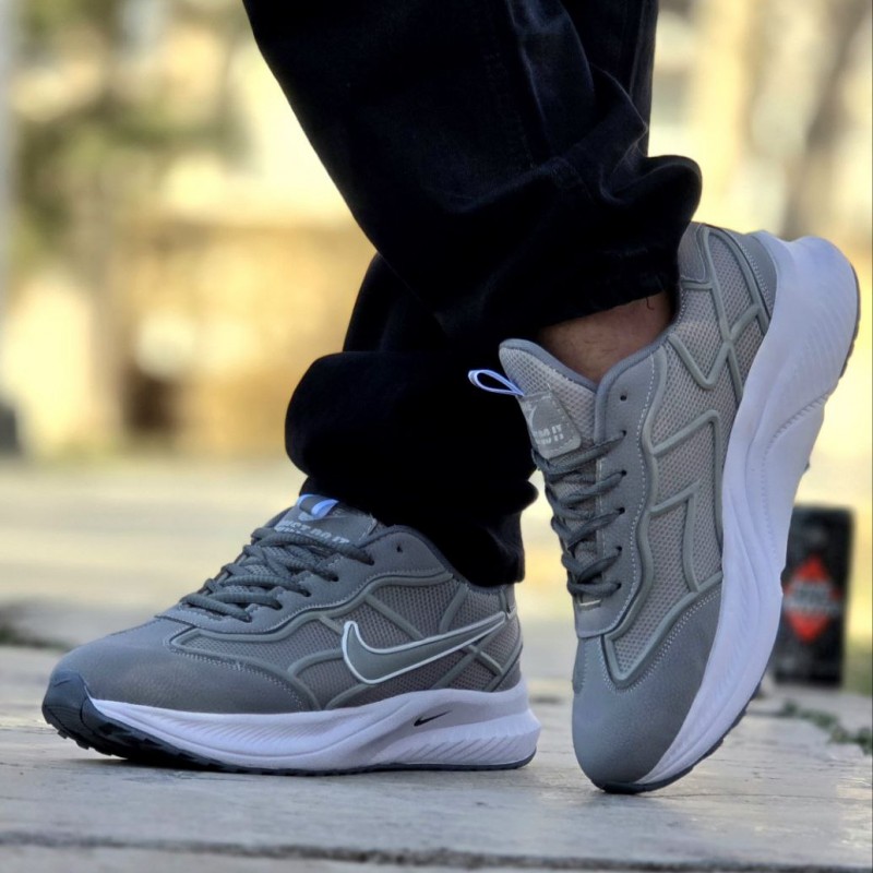 فروش هیجان انگیز کفش اسپرت مردانه  و پسرانه مدل نایک رنگ طوسی زیره سفید   زیره پیو مناسب ورزش با ارسال رایگان