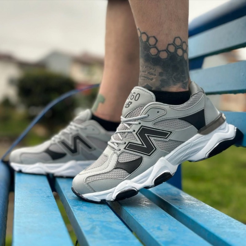 بمب تخفیفی این هفته کفش کتونی اسپرت مردانه  و پسرانه مدل نیوبالانس رنگ طوسی مشکی زیره سفید یه کار شیک  و خاص  با ارسال  رایگان