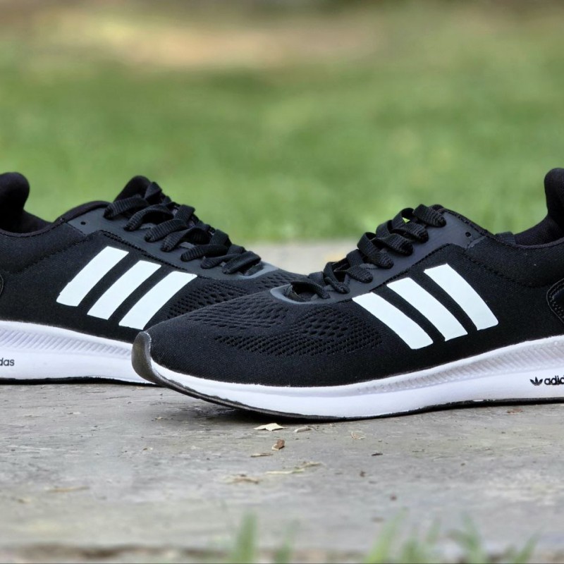 فروش بی نظیر کفش کتونی اسپرت مردانه و پسرانه مدل ادیداس اسپیسر بزرگپا به روز و جدید رنگ مشکی سفید  با ارسال رایگان