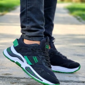 فروش ویژه  کفش کتونی اسپرت مردانه و پسرانه مدل جدید رنگ مشکی  سبز زیره پیو  مناسب پیاده روی  با ارسال رایگان