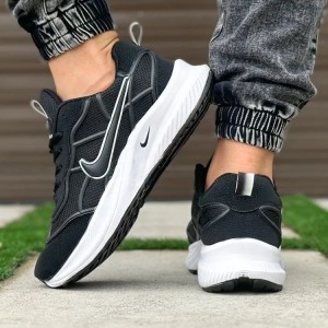 فروش عاااالی کفش کتونی اسپرت پسرانه و مردانه مدل نایک مقاوم وخاص رنگ سفید مشکی با ارسال رایگان