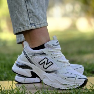 فروش هیجان انگیز کفش اسپرت زنانه دخترانه مدل نیوبالانس طرح کپسولی نرم و راحت رنگ مشکی زیره سفید با ارسال رایگان