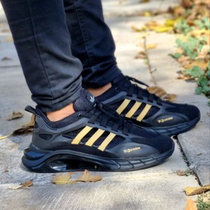 کفش کتونی اسپرت مردانه و پسرانه ادیداس کپسولی مشکی طلایی جذاب و شیک  بااراسال رایگان