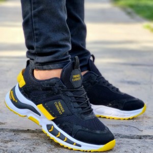 کفش کتونی اسپرت مردانه پسرانه مدل  ترند رویه بافت محکم و با کیفیت مشکی زرد با ارسال رایگان
