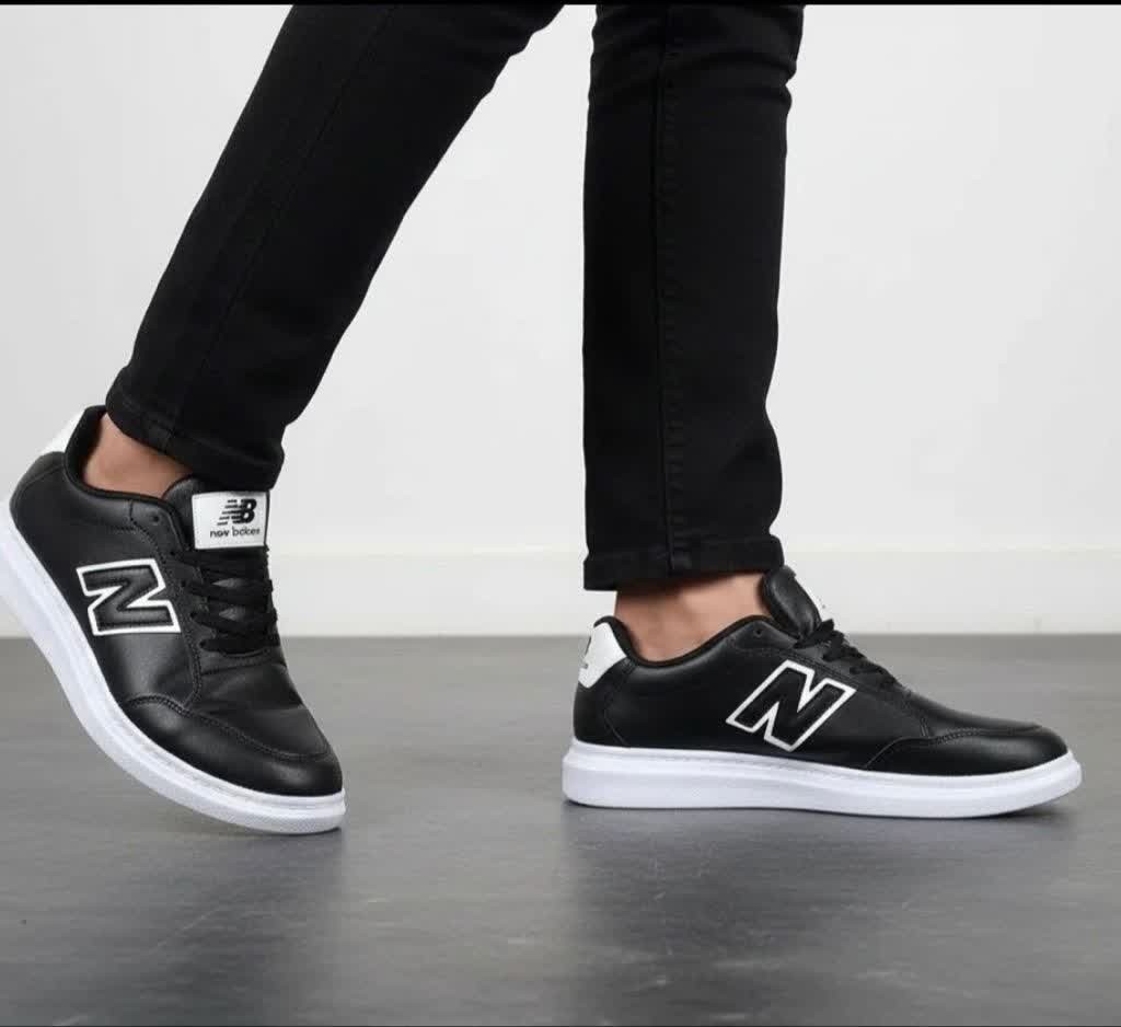 فروش جذاب کفش ونس کتونی اسپرت مردانه و پسرانه مدل نیوبالانس نرم و راحت رنگ مشکی سفید با ارسال رایگان