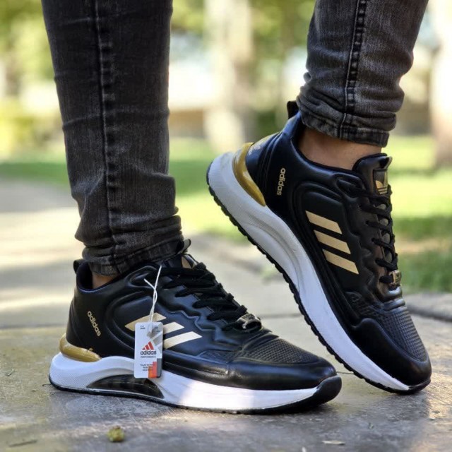 فروش فوق العاده کفش کتونی اسپرت  مردانه و پسرانه مدل ادیداس شیک و راحت رنگ  مشکی طلایی با ارسال رایگان کد 3731