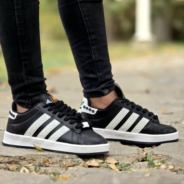 حراج  استثنایی کفش کتونی اسپرت ونس مردانه پسرانه مدل lego  مقاوم و با کیفیت رنگ مشکی سفید باارسال رایگان