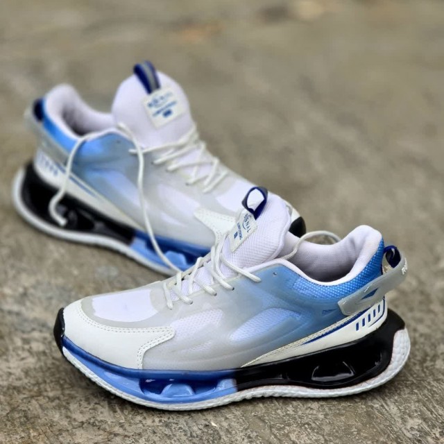 تخفیف پاییزه کفش کتونی اسپرت  مردانه پسرانه مدل نایک زیره کپسولی شیک و ویژه رنگ سفید ابی مشکی   با ارسال رایگان