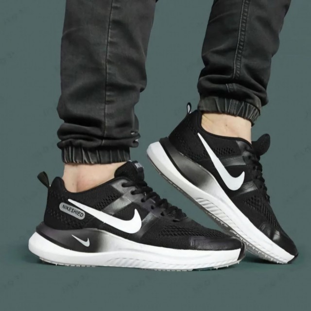 تخفیف بمب این هفته کفش کتونی مردانه و پسرانه مدل نایک رنگ مشکی  سفید مناسب افراد شیک پوش با ارسال رایگان