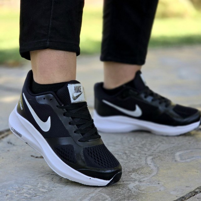 حراج واقعی کفش کتونی اسپرت زنانه و دخترانه مدل نایک رنگ مشکی سفید  زیره پیو مناسب برای باشگاه و ورزش با ارسال رایگان