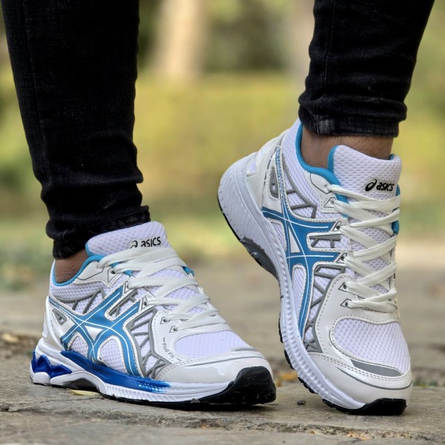 بمب تخفیف ویژه کفش کتونی اسپرت  مردانه و پسرانه مدل اسیکس  رنگ سفید آبی یه کار فوق العاده شیک و زیبا  با ارسال رایگان