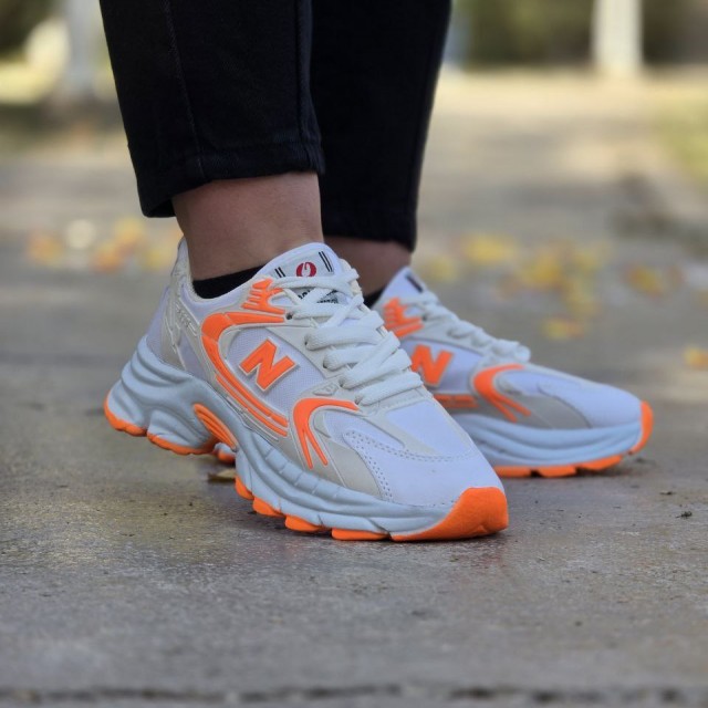 تخفیف جذاب کفش کتونی اسپرت زنانه دخترانه مدل نیوبالانس  پرفروش و دلبر رنگ سفید نارنجی  با ارسال رایگان
