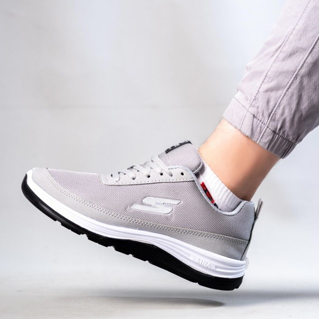 حراج عالی کفش اسپرت اسکیچرز مردانه خاص و بی نظیر رنگ طوسی روشن با ارسال رایگان