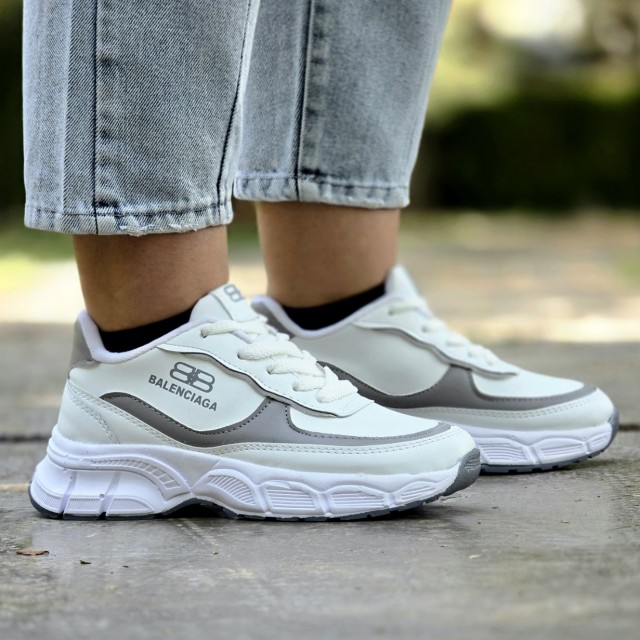 حراج عالی  کفش کتونی اسپرت زنانه دخترانه مدل بالنسیاگا یه مدل خاص مناسب خانم های خوش سلیقه رنگ سفید طوسی با ارسال رایگان