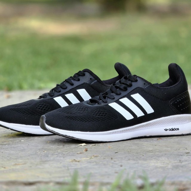 فروش واقعی کفش اسپرت مردانه مدل ادیداس اسپیسر بزرگپا عالی رنگ مشکی سفید باارسال رایگان