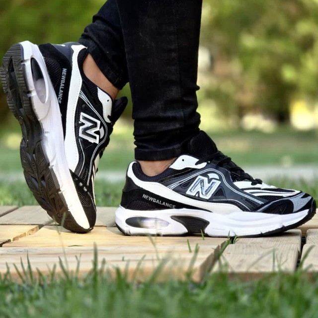 فروش عالی کفش کتونی اسپرت مردانه و پسرانه مدل نیوبالانس طرح کپسولی  پرفروش و خاص  رنگ  مشکی سفید  با ارسال رایگان