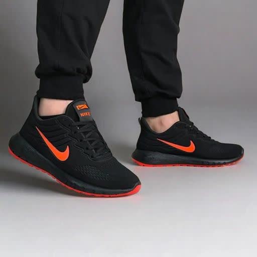 فروش جدیدکفش کتونی اسپرت نایک مردانه پسرانه باکیفیتی عالی  رنگ مشکی نارنجی با ارسال رایگان