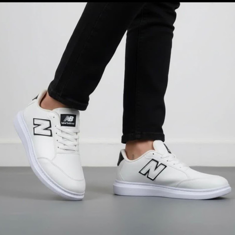 فروش واقعی کفش ونس کتونی اسپرت مردانه و پسرانه مدل نیوبالانس  شیک و پرفروش رنگ سفیدمشکی  با ارسال رایگان