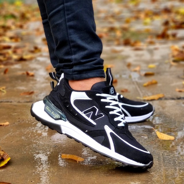 خرید کفش نیوبالانس شیک کتونی اسپرت پسرانه مردانه زیره پیو راحت مشکی سفید