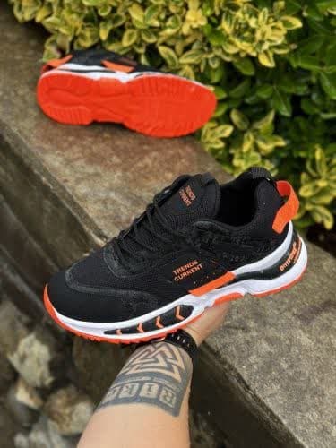 کفش اسپرت مردانه فوق العاده بادوام و عالی مدل ترندمشکی نارنجی  بروز با ارسال رایگان 3331
