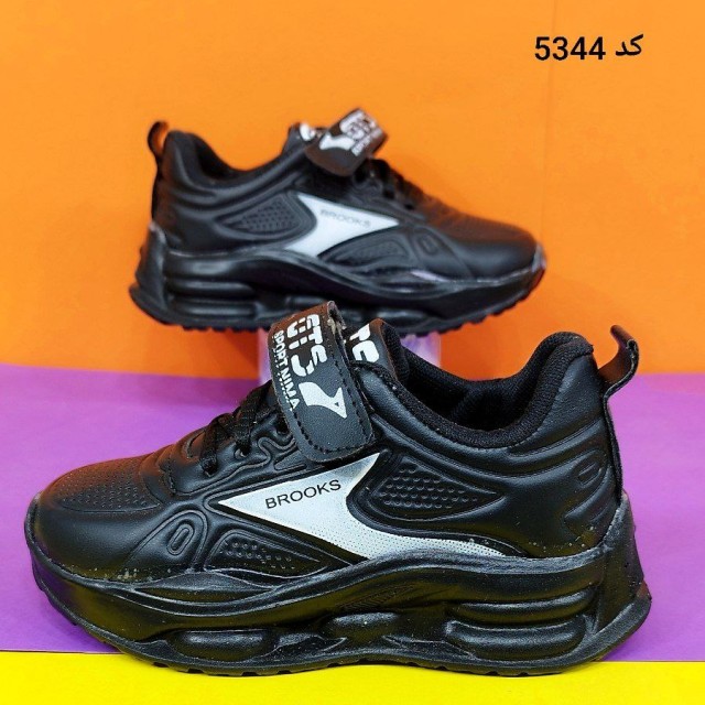 کفش کتونی اسپرت بچگانه مدل بروکس با طراحی فوق العاده زیبا مشکی سفید با ارسال رایگان