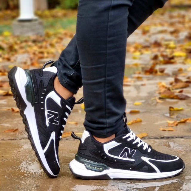 حراج باورنکردنی کفش کتونی اسپرت مردانه و پسرانه مدل نیوبالانس مناسب برای خوش سلیقه ها مشکی سفید  با ارسال رایگان