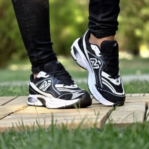 فروش رویایی کفش کتونی اسپرت مردانه و پسرانه مدل نیوبالانس طرح کپسولی  محکم و جذاب  رنگ  مشکی تمام با ارسال رایگان