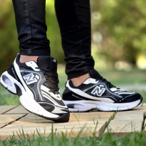 فروش رویایی کفش کتونی اسپرت مردانه و پسرانه مدل نیوبالانس طرح کپسولی  محکم و جذاب  رنگ  مشکی تمام با ارسال رایگان