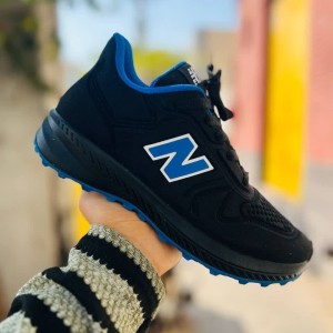 فروش ارزان کفش کتونی اسپرت مردانه و پسرانه مدل نیوبالانس زیبا و بادوام رنگ مشکی نارنجی با ارسال رایگان