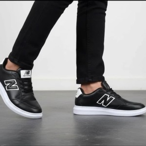 فروش جذاب کفش ونس کتونی اسپرت مردانه و پسرانه مدل نیوبالانس نرم و راحت رنگ مشکی سفید  با ارسال رایگان