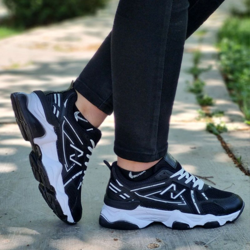 فروش جدید ترین کفش اسپرت دخترانه مدل نیوبالانس رنگ مشکی سفید یه کار بی نظیر و بی همتا  با ارسال رایگان