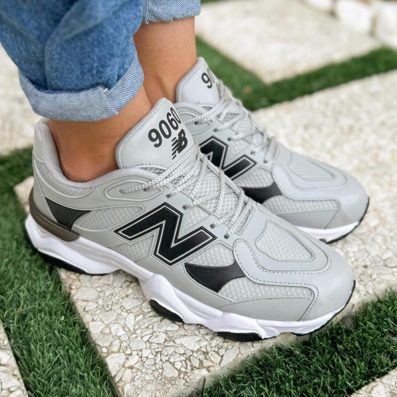 حراج شیک ترین  کفش اسپرت  مردانه و پسرانه مدل نیوبالانس رنگ طوسی مشکی زیره سفید یکار بی نهایت جذاب و مدرن با ارسال رایگان