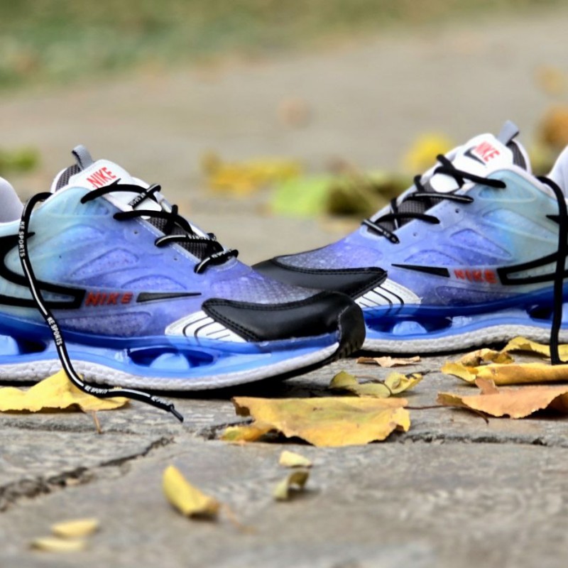 تخفیف ویژه این هفته کفش کتونی مردانه و پسرانه مدل نایک زیره کپسولی   رنگ آبی مشکی زیره راحت مناسب باشگاه و ورزش با ارسال رایگان