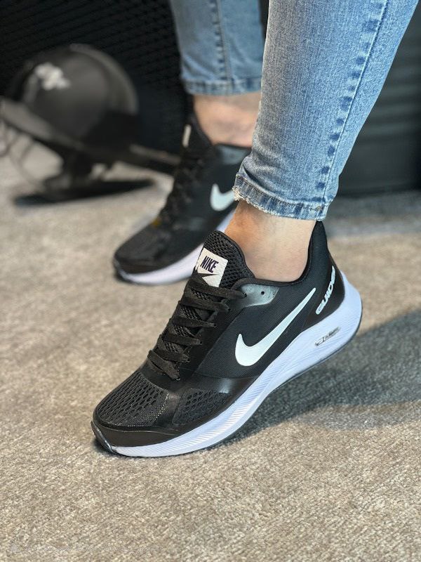 فروش ویژه کفش کتونی اسپرت مردانه و پسرانه مدل نایک  رنگ مشکی نایک هفت رنگ زیره سفید جدید و جذاب با ارسال رایگان