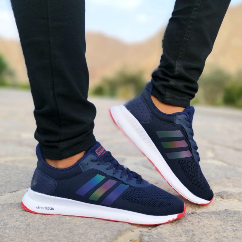 تخفیف ویژه کفش کتونی اسپرت مردانه و پسرانه مدل ادیداس رنگ سورمه ای هولوگرامی زیره سفید خاص و زیبا با ارسال رایگان