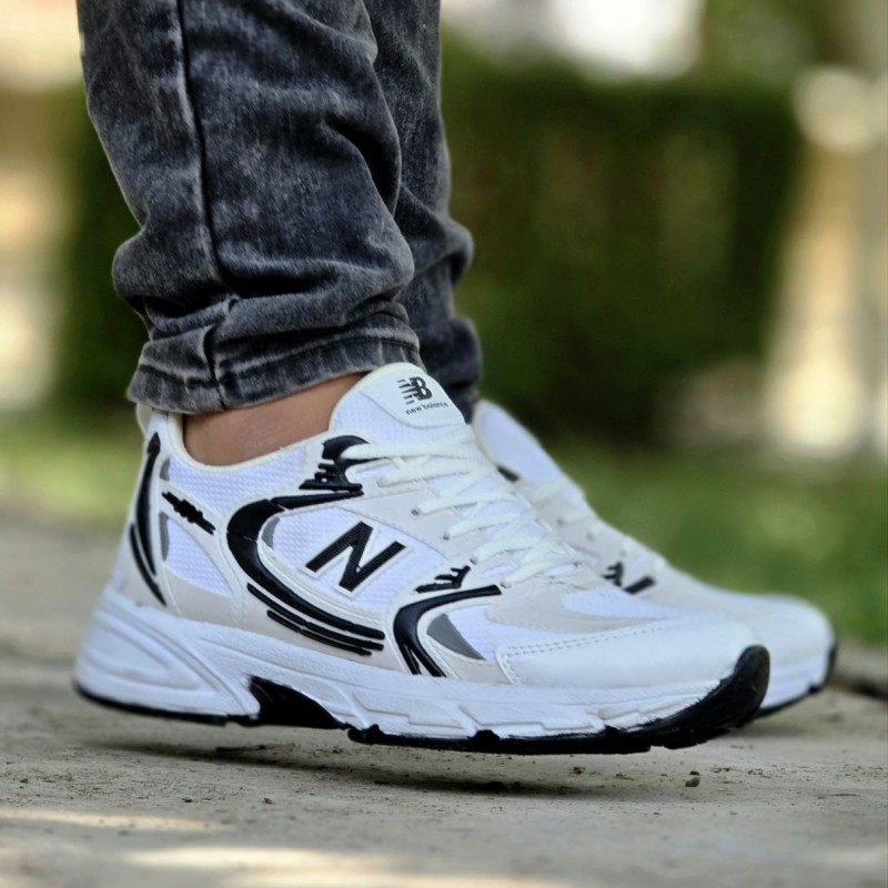 حراجی کفش کتونی اسپرت مردانه و زنانه مدل نیوبالانس 530 مقاوم و راحت رنگ سفید مشکی  با ارسال رایگان