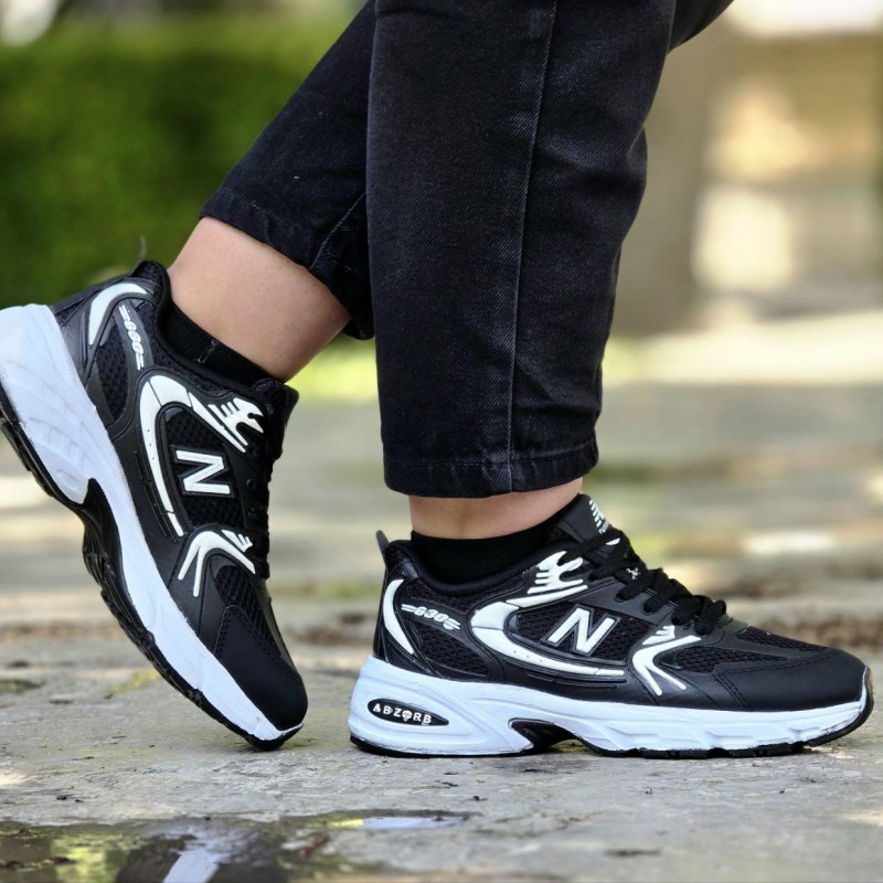 حراجی ویژه کفش کتونی اسپرت مردانه و زنانه مدل نیوبالانس 530 شیک و جدید رنگ مشکی سفید  با ارسال رایگان