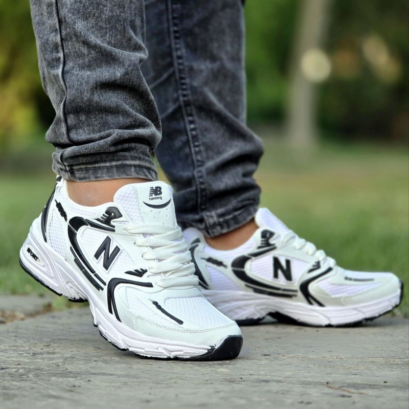 حراج ارزان کفش کتونی اسپرت مردانه و زنانه مدل نیوبالانس 530  خاص و با دوام رنگ سفید مشکی با ارسال رایگان