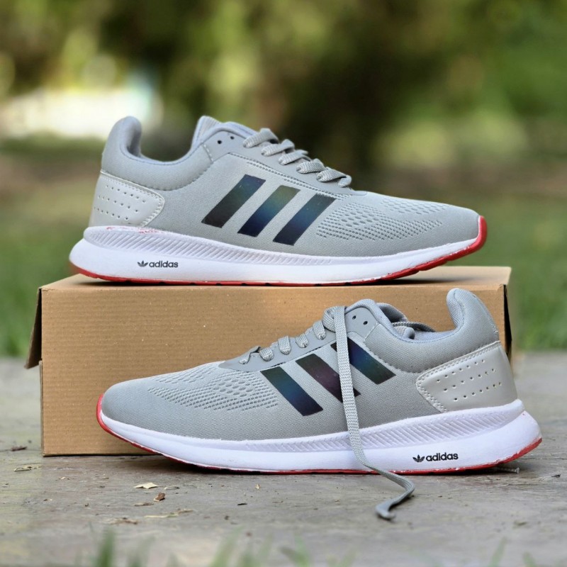 فروش بادوام  کفش کتونی اسپرت مردانه و پسرانه مدل ادیداس اسپیسر بزرگپا شیک و مقاوم رنگ طوسی هولوگرامی با ارسال رایگان