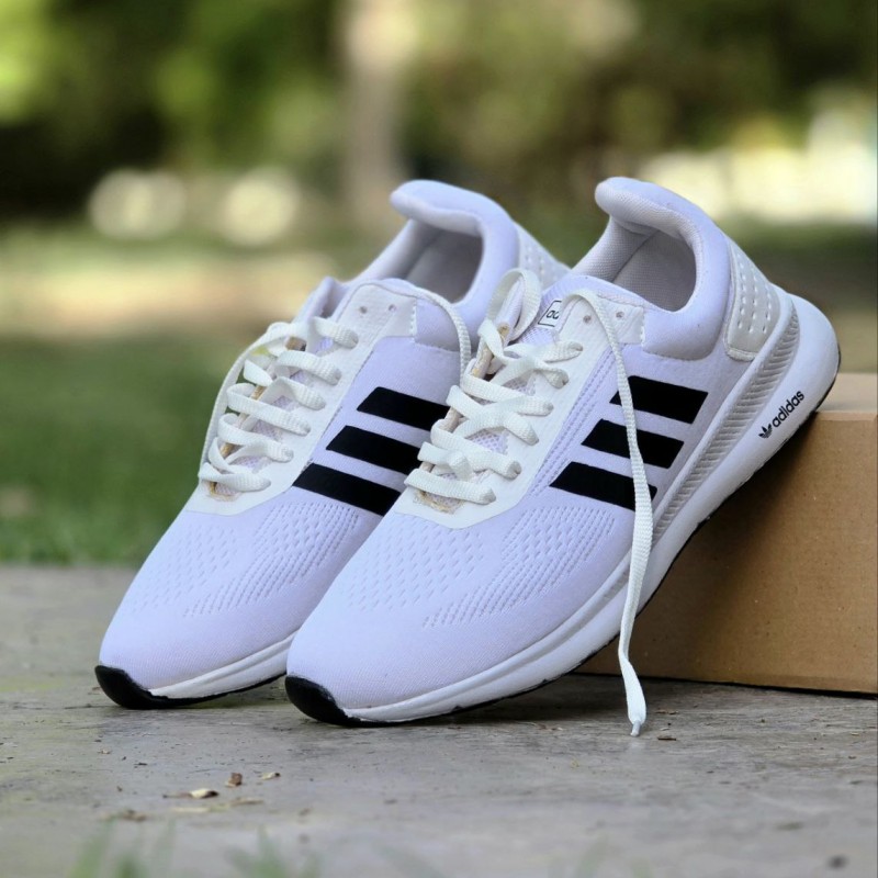 فروش هیجان انگیز کفش کتونی اسپرت مردانه و پسرانه مدل ادیداس اسپیسر بزرگپا  محکم و مقاوم رنگ سفید مشکی  با ارسال رایگان