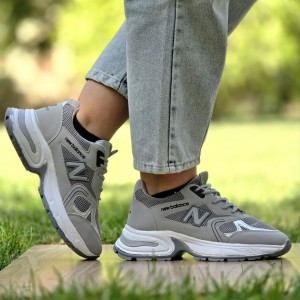 حراج عاالی کفش کتونی اسپرت دخترانه و زنانه مدل نیوبالانس اصیل و سبک رنگ طوسی نقره ای با ارسال رایگان